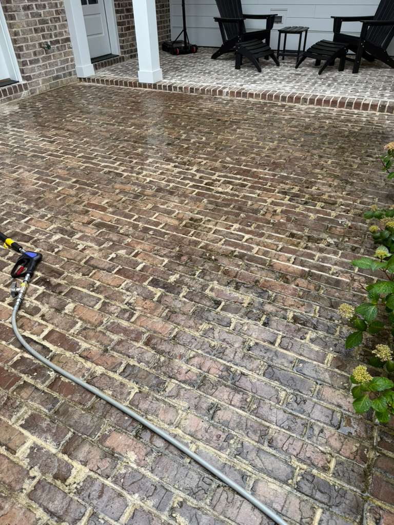 Brick patio before, dirty